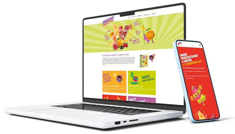 Website-Design der Fruchtgiganten, dargestellt auf einem Laptop und einem Smartphone. Modernes, responsives Layout, das die Marke und ihre Produkte auf allen Endgeräten optimal präsentiert. Beispiel für nutzerfreundliches Webdesign und zielgerichtete Markenkommunikation.